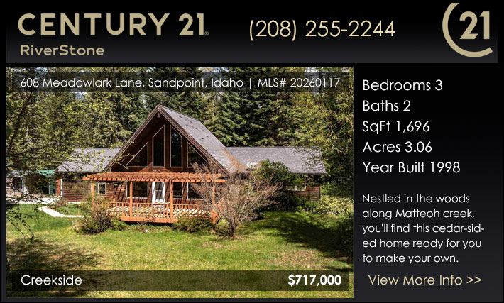Nestled in the woods along Matteoh creek, youll find this cedar-sided home